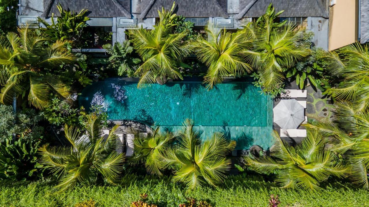 Weda Cita Resort And Spa By Mahaputra ウブド エクステリア 写真 The swimming pool at the hotel